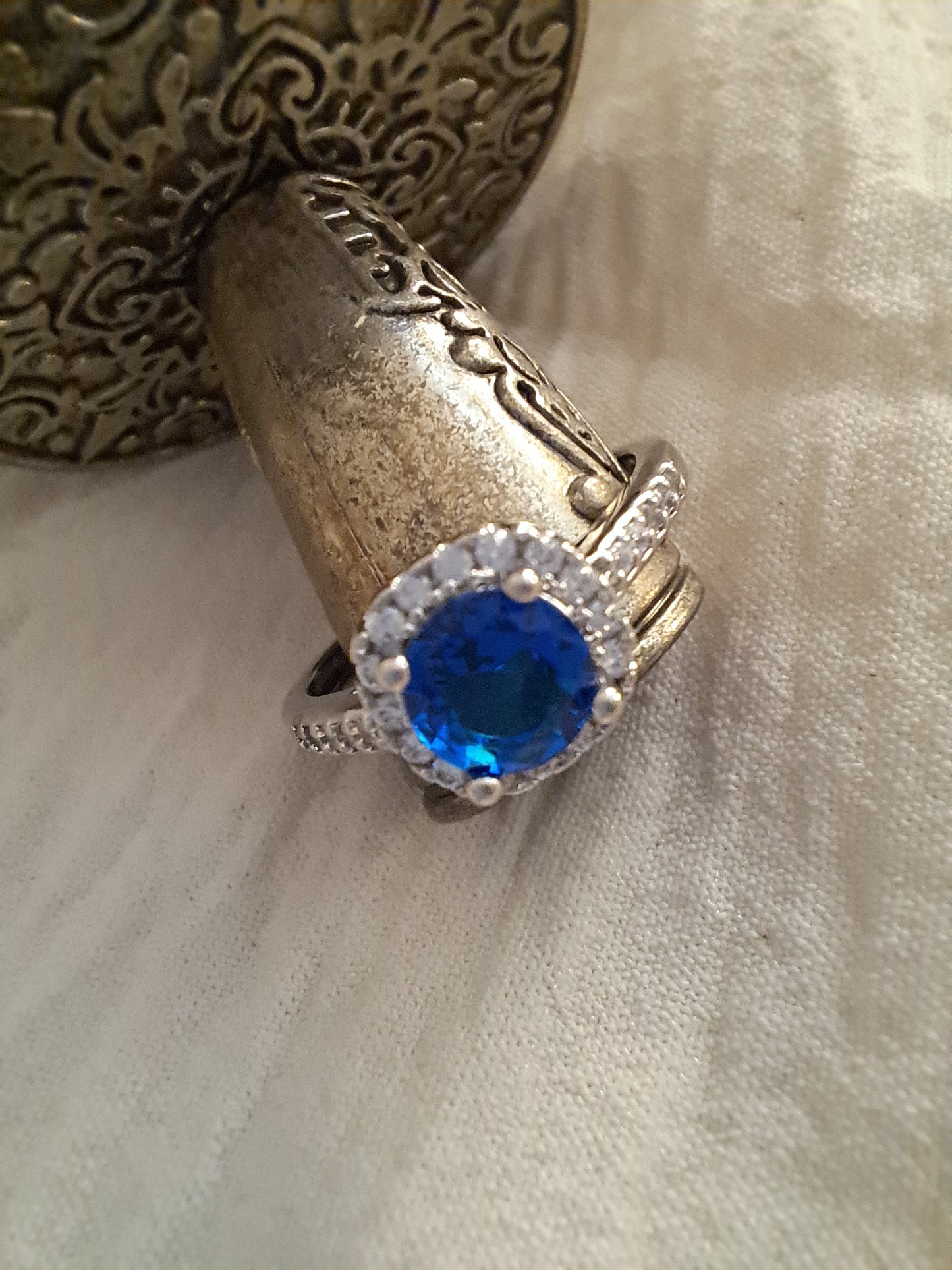 Sapphire blue stone on silver ring