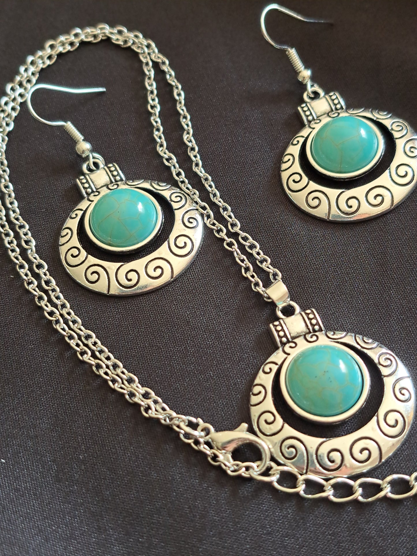 Turquoise and silver earring and necklace set