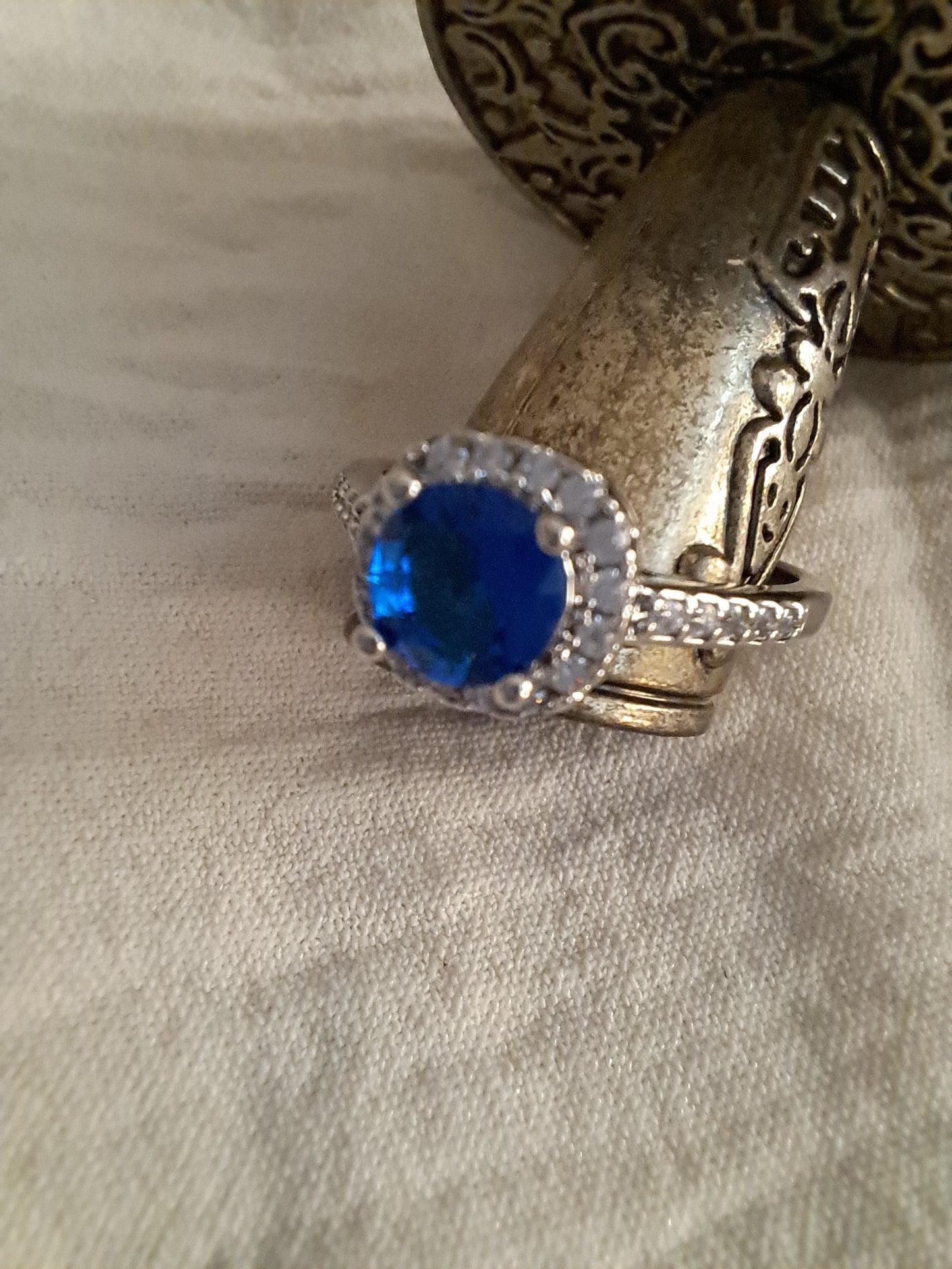 Sapphire blue stone on silver ring