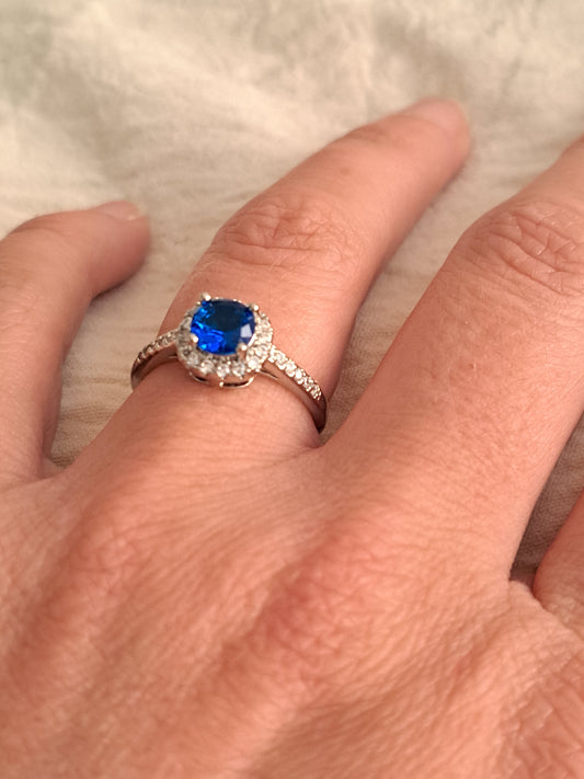 Sapphire blue stone on silver ring