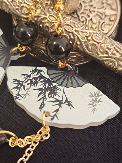 Black and white fan dangle earrings